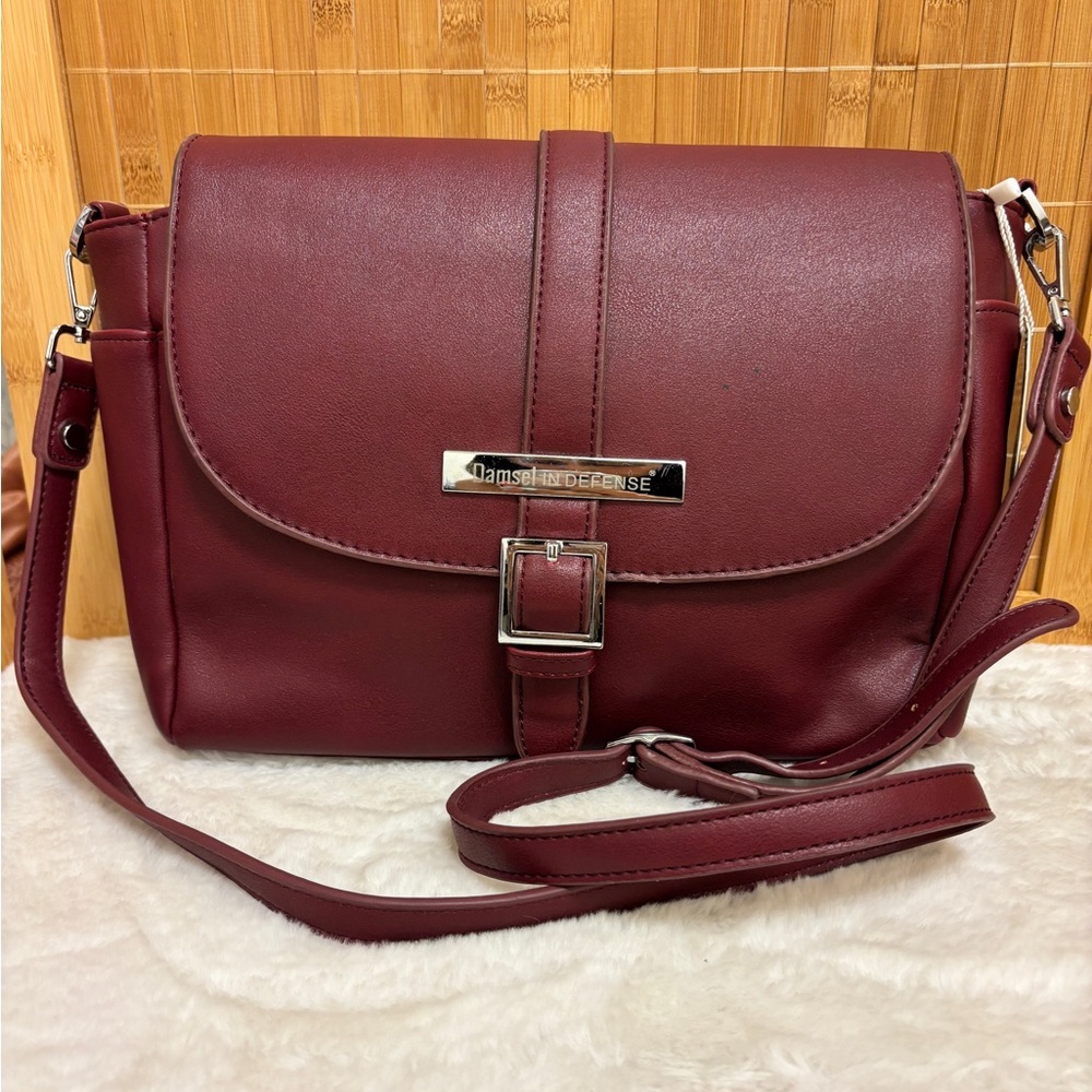 Damsel in Defense Burgundy Crossbody Bag